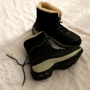 Black And Grey Winter Boots Laced Up With Fluffy White Cottony Lining